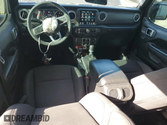 2023 Jeep Wrangler Rubicon z VIN 1C4JJXR62PW663711, wystawiony jako Copart lot #54816255 z przebiegiem 29 123 mil mil oraz Szkoda całkowita • Salvage title. Historia ofert i sprzedaży dostępna na DreamBid. Obrazek 8.