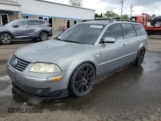 2004 Volkswagen Passat GLX with VIN WVWYH63B84E116003, listed as a Copart auction lot 65235945 with 125,881 mi miles and Salvage title. Bid and sale history available at DreamBid. Image 1.