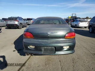 2001 Chrysler LHS z VIN 2C3AC56G31H606648, wystawiony jako Copart lot #77123814 z przebiegiem 83 574 mil mil oraz Tytuł czysty. Historia ofert i sprzedaży dostępna na DreamBid. Obrazek 6.
