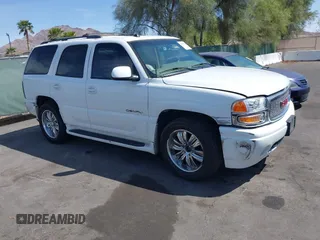 2005 GMC Yukon Denali z VIN 1GKEK63U05J263323, wystawiony jako IAAI lot #41960528 z przebiegiem 174 599 mil mil oraz . Historia ofert i sprzedaży dostępna na DreamBid. Obrazek 1.