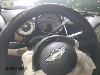 2011 MINI Convertible с VIN WMWZN3C5XBTZ89537, выставлен на аукционе Copart как лот 44161315 с пробегом Не указан миль и Чистый • Clean title. История ставок и продаж доступна на DreamBid. Изображение 9.
