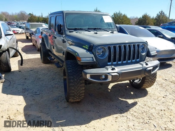 2020 Jeep Gladiator Overland z VIN 1C6HJTFG4LL143369, wystawiony jako IAAI lot #41827409 z przebiegiem 77 752 mil mil oraz . Historia ofert i sprzedaży dostępna na DreamBid. Obrazek 1.