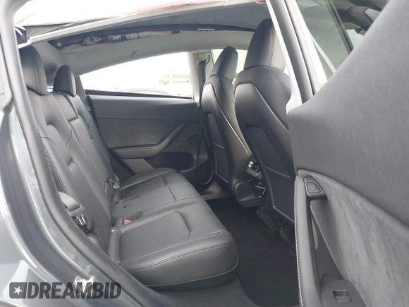 2023 Tesla Model Y Long Range with VIN 7SAYGDEE4PA028440, listed as a IAAI auction lot 41488136 with 29,229 mi miles and . Bid and sale history available at DreamBid. Image 8.