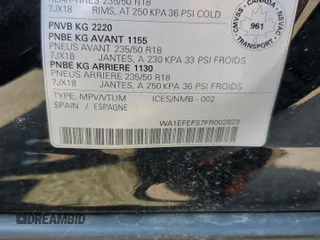 2015 Audi Q3 with VIN WA1EFEFS7FR002823, listed as a Copart auction lot 62159355 with 163,640 mi miles and Salvage title. Bid and sale history available at DreamBid. Image 14.