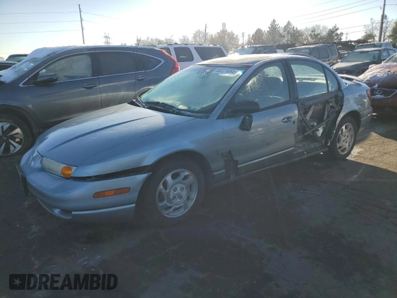 2001 Saturn SL with VIN 1G8ZJ52731Z329956, listed as a Copart auction lot 80221654 with 217,358 mi miles and Salvage Title. Bid and sale history available at DreamBid. Image 1.