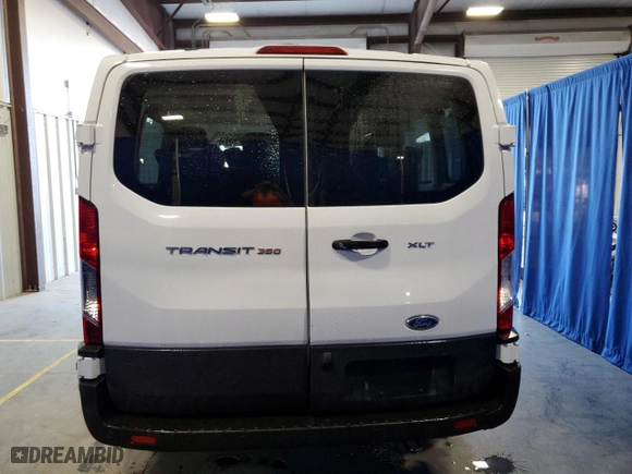 2021 Ford Transit Passenger Wagon XL with VIN 1FBAX2Y83MKA52002, listed as a Copart auction lot 84449034 with 69,848 mi miles and Clean Title. Bid and sale history available at carsss.com. Image 6.