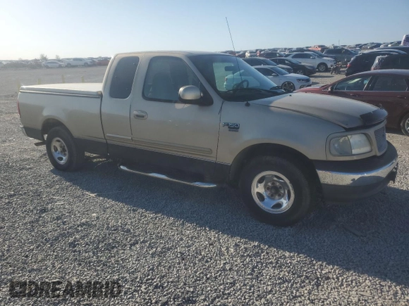 1999 Ford F-150 with VIN 1FTRX17W9XNB77873, listed as a Copart auction lot 52851065 with Not provided miles and Salvage title. Bid and sale history available at DreamBid. Image 4.