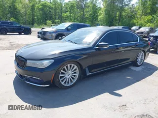 2016 BMW 7 Series 740i with VIN WBA7E2C55GG547752, listed as a IAAI auction lot 41992704 with Not Provided miles and . Bid and sale history available at carsss.com. Image 16.