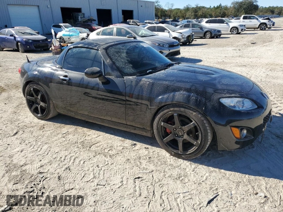 2010 Mazda MX-5 Miata Grand Touring with VIN JM1NC2FFXA0208277, listed as a Copart auction lot 41381815 with 98,293 mi miles and Salvage title. Bid and sale history available at DreamBid. Image 4.