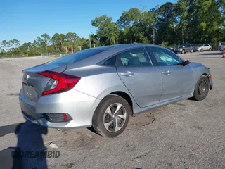 2020 Honda Civic LX with VIN 19XFC2F63LE004953, listed as a IAAI auction lot 41824922 with 71,458 mi miles and . Bid and sale history available at DreamBid. Image 4.