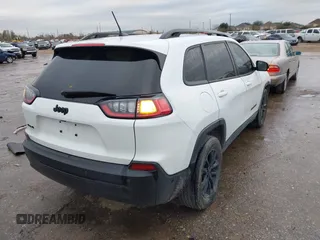 2023 Jeep Cherokee Altitude Lux with VIN 1C4PJMMB1PD110251, listed as a IAAI auction lot 41343772 with 33,182 mi miles. Bid and sale history available at carsss.com. Image 4.