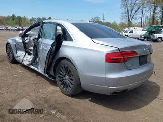 2015 Audi A8 4.0T z VIN WAU32AFD2FN038880, wystawiony jako IAAI lot #42138932 z przebiegiem 102 968 mil mil oraz . Historia ofert i sprzedaży dostępna na DreamBid. Obrazek 3.