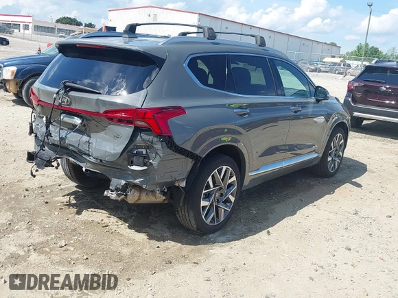 2023 Hyundai Santa Fe Calligraphy with VIN 5NMS54ALXPH633514, listed as a IAAI auction lot 42238114 with 12,969 mi miles and . Bid and sale history available at DreamBid. Image 4.