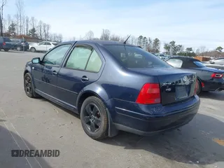 2000 Volkswagen Jetta GL z VIN 3VWRA29M2YM113489, wystawiony jako IAAI lot #41611184 z przebiegiem 210 865 mil mil oraz . Historia ofert i sprzedaży dostępna na DreamBid. Obrazek 3.