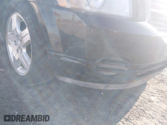 2008 Dodge Caliber SE with VIN 1B3HB28B58D776158, listed as a IAAI auction lot 41872879 with 197,843 mi miles and . Bid and sale history available at DreamBid. Image 14.