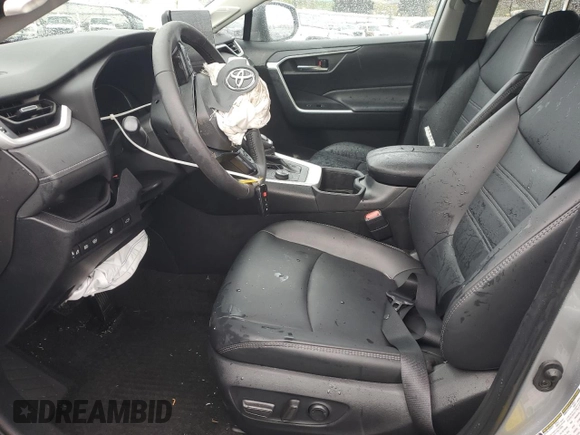 2024 Toyota RAV4 Hybrid XLE Premium with VIN 2T3B6RFV6RW066043, listed as a Copart auction lot 43470115 with 9,454 mi miles and Salvage Title. Bid and sale history available at DreamBid. Image 7.