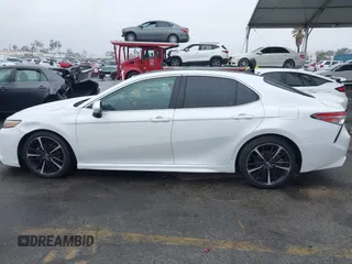 2018 Toyota Camry XSE with VIN 4T1BZ1HK8JU019394, listed as a IAAI auction lot 41492529 with 107,745 mi miles and . Bid and sale history available at DreamBid. Image 13.