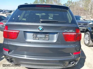 2011 BMW X5 35i with VIN 5UXZV4C51BL740731, listed as a IAAI auction lot 41771257 with 148,638 mi miles. Bid and sale history available at carsss.com. Image 16.