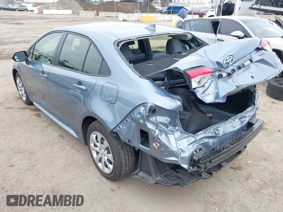 2023 Toyota Corolla Hybrid LE with VIN JTDBCMFE8PJ013271, listed as a IAAI auction lot 42099797 with 14,080 mi miles and . Bid and sale history available at carsss.com. Image 3.