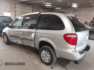 2003 Dodge Grand Caravan with VIN 2D4GP44353R166193, listed as a IAAI auction lot 41908698 with 181,371 mi miles and . Bid and sale history available at DreamBid. Image 6.