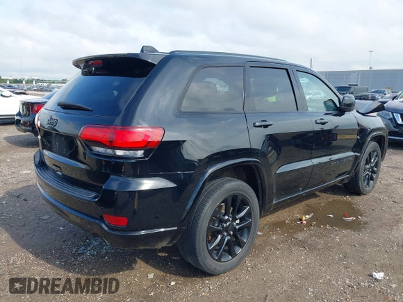 2021 Jeep Grand Cherokee Laredo E with VIN 1C4RJEAG0MC571375, listed as a IAAI auction lot 42087648 with 29,358 mi miles and . Bid and sale history available at DreamBid. Image 4.