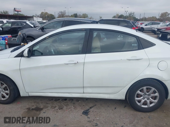 2013 Hyundai Accent GLS with VIN KMHCT4AE3DU325550, listed as a IAAI auction lot 41185651 with 128,791 mi miles and . Bid and sale history available at DreamBid. Image 14.