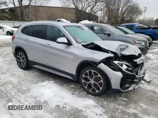 2021 BMW X1 xDrive28i with VIN WBXJG9C02M5T38320, listed as a Copart auction lot 45717075 with 31,300 mi miles and Salvage Title. Bid and sale history available at carsss.com. Image 4.