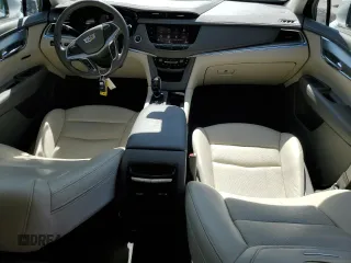 2021 Cadillac XT5 FWD Premium Luxury z VIN 1GYKNCRS2MZ209820, wystawiony jako Copart lot #51332565 z przebiegiem 52 916 mil mil oraz Szkoda całkowita • Salvage title. Historia ofert i sprzedaży dostępna na DreamBid. Obrazek 8.