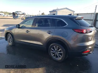 2021 Mazda CX-9 Sport with VIN JM3TCBBY5M0502888, listed as a Copart auction lot 61299673 with 50,576 mi miles and . Bid and sale history available at DreamBid. Image 2.