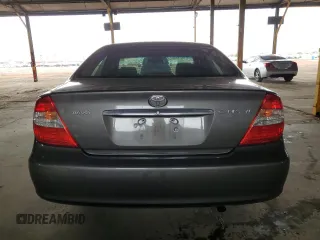 2004 Toyota Camry LE with VIN 4T1BE32K74U884720, listed as a Copart auction lot 49534195 with 253,516 mi miles and Salvage Title. Bid and sale history available at DreamBid. Image 6.