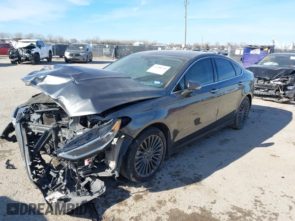 2017 Ford Fusion Hybrid Titanium z VIN 3FA6P0RU0HR314681, wystawiony jako IAAI lot #41288256 z przebiegiem 174 027 mil mil oraz . Historia ofert i sprzedaży dostępna na DreamBid. Obrazek 17.