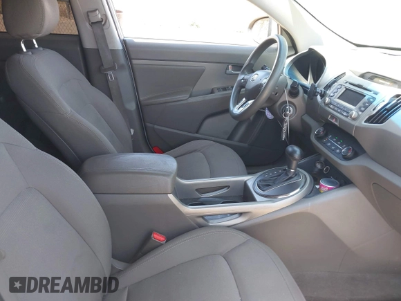 2012 Kia Sportage LX with VIN KNDPB3A27C7326884, listed as a IAAI auction lot 42010016 with 112,797 mi miles. Bid and sale history available at carsss.com. Image 5.