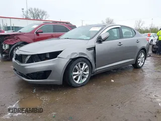 2013 Kia Optima EX z VIN 5XXGN4A72DG166687, wystawiony jako IAAI lot #41967631 z przebiegiem 202 712 mil mil oraz . Historia ofert i sprzedaży dostępna na DreamBid. Obrazek 6.