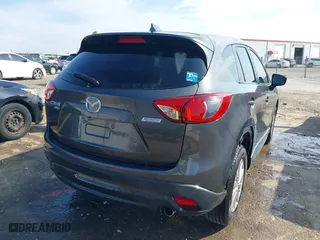 2016 Mazda CX-5 Touring with VIN JM3KE4CY3G0672977, listed as a IAAI auction lot 41889137 with 130,593 mi miles. Bid and sale history available at carsss.com. Image 4.