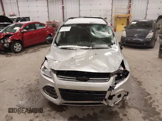 2014 Ford Escape SE z VIN 1FMCU9GX1EUD67624, wystawiony jako IAAI lot #41986362 z przebiegiem 79 921 mil mil oraz . Historia ofert i sprzedaży dostępna na DreamBid. Obrazek 6.