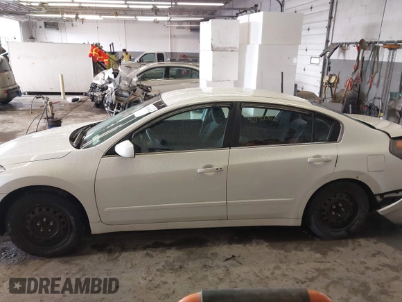 2009 Nissan Altima S z VIN 1N4AL21E59N477966, wystawiony jako IAAI lot #42190062 z przebiegiem 171 127 mil mil oraz . Historia ofert i sprzedaży dostępna na DreamBid. Obrazek 15.