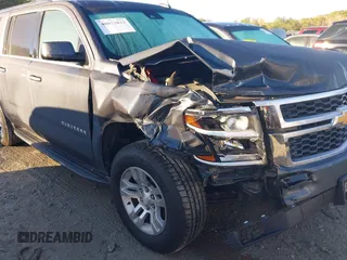 2019 Chevrolet Suburban LT with VIN 1GNSCHKC9KR327072, listed as a IAAI auction lot 40852032 with 109,815 mi miles and . Bid and sale history available at DreamBid. Image 6.