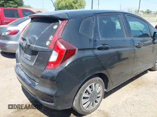 2019 Honda Fit LX z VIN 3HGGK5H45KM753568, wystawiony jako IAAI lot #42004174 z przebiegiem 96 406 mil mil oraz . Historia ofert i sprzedaży dostępna na DreamBid. Obrazek 4.