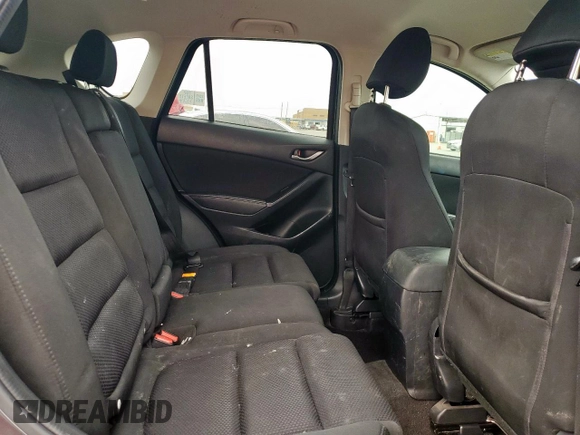 2016 Mazda CX-5 Touring z VIN JM3KE2CY7G0654292, wystawiony jako Copart lot #53433745 z przebiegiem 168 273 mil mil oraz Szkoda całkowita • Salvage title. Historia ofert i sprzedaży dostępna na DreamBid. Obrazek 11.