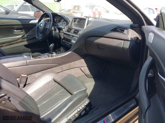 2012 BMW 6 Series 650i with VIN WBALX3C5XCC528484, listed as a IAAI auction lot 42080063 with 120,995 mi miles. Bid and sale history available at carsss.com. Image 5.