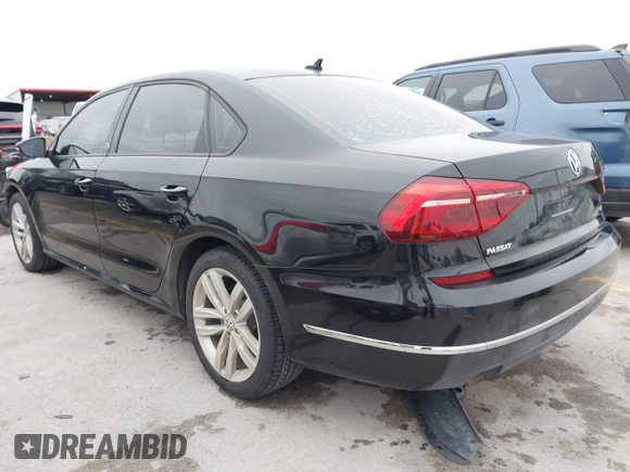 2019 Volkswagen Passat 2.0T Wolfsburg Edition with VIN 1VWLA7A36KC007173, listed as a IAAI auction lot 41357381 with 79,356 mi miles. Bid and sale history available at carsss.com. Image 3.
