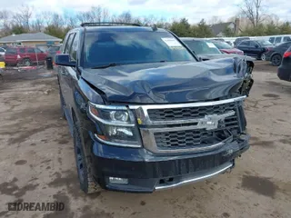 2018 Chevrolet Tahoe LT with VIN 1GNSKBKC6JR188307, listed as a IAAI auction lot 41448687 with 95,689 mi miles. Bid and sale history available at carsss.com. Image 1.