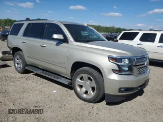 2017 Chevrolet Tahoe LT with VIN 1GNSCBKC8HR148415, listed as a Copart auction lot 52517745 with 149,182 mi miles and Salvage title. Bid and sale history available at DreamBid. Image 4.