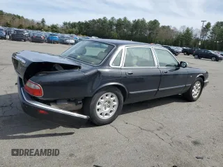 2002 Jaguar XJ 8 with VIN SAJDA14C62LF40435, listed as a Copart auction lot 52022645 with 153,703 mi miles and Salvage title. Bid and sale history available at DreamBid. Image 3.