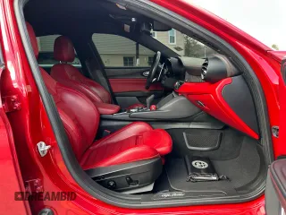 2020 Alfa Romeo Giulia Ti Sport z VIN ZARFAMBN7L7626380, wystawiony jako Copart lot #47583435 z przebiegiem 63 898 mil mil oraz Czysty tytuł • Clean title. Historia ofert i sprzedaży dostępna na DreamBid. Obrazek 6.