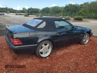 1997 Mercedes-Benz SL-Class with VIN WDBFA67F3VF147355, listed as a Copart auction lot 74295594 with 0 mi miles and Salvage Title. Bid and sale history available at carsss.com. Image 3.