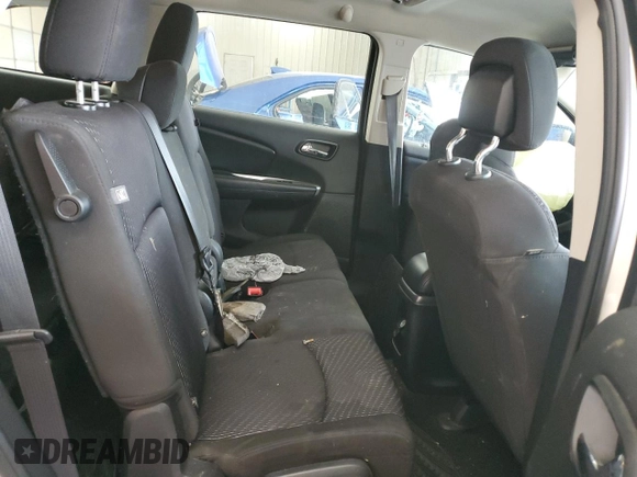 2015 Dodge Journey SE z VIN 3C4PDCAB0FT720639, wystawiony jako Copart lot #55200395 z przebiegiem 105 640 mil mil oraz Szkoda całkowita • Salvage title. Historia ofert i sprzedaży dostępna na DreamBid. Obrazek 11.