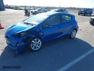 2013 Toyota Prius c One with VIN JTDKDTB32D1055135, listed as a IAAI auction lot 41889844 with 98,220 mi miles. Bid and sale history available at carsss.com. Image 2.