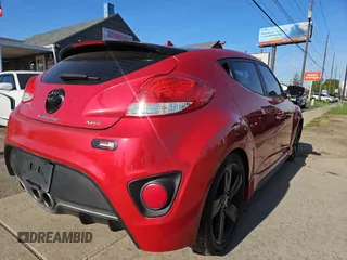 2013 Hyundai Veloster Turbo w/Black Int with VIN KMHTC6AE4DU142055, listed as a Copart auction lot 54666655 with 110,777 mi miles and Clean Title. Bid and sale history available at carsss.com. Image 4.