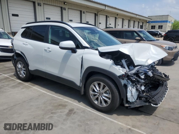 2023 Toyota Corolla Cross LE with VIN 7MUCAAAG2PV053730, listed as a Copart auction lot 54825035 with 33,313 mi miles and Salvage title. Bid and sale history available at DreamBid. Image 4.
